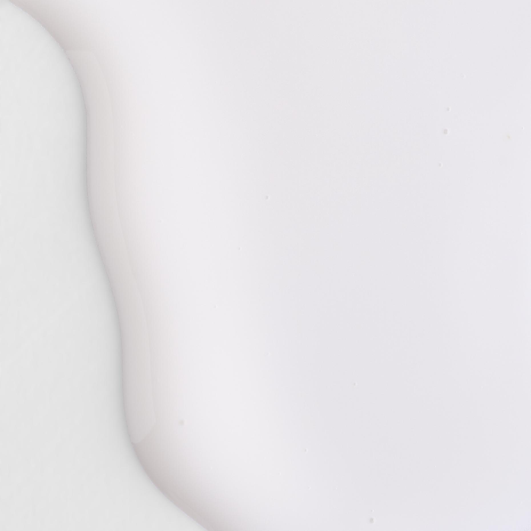 A smooth, white, liquid surface with subtle curves and light reflections.